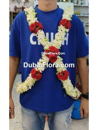 baddi with tuberoses and red baby roses 