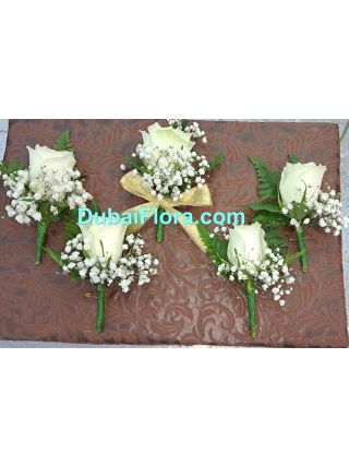 Boutonnieres with white rose and Gypsophilia