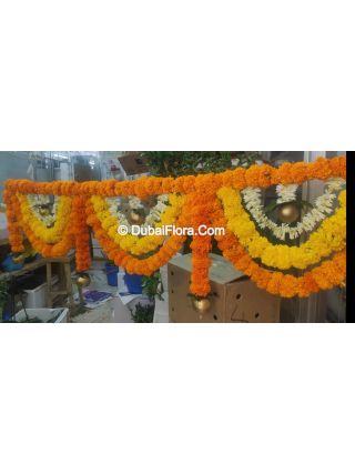 Flower Toran Of Fresh Mariegold Yellow Orange And Tuberoses With Golden Ball