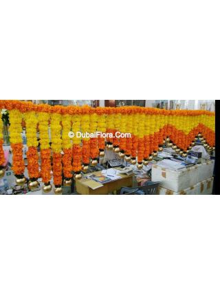 Flower Toran Of Fresh Mariegold Yellow Orange V Shape With Golden Ball